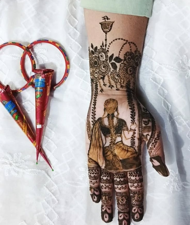 Bridal mehendi — groom's name hidden in the design